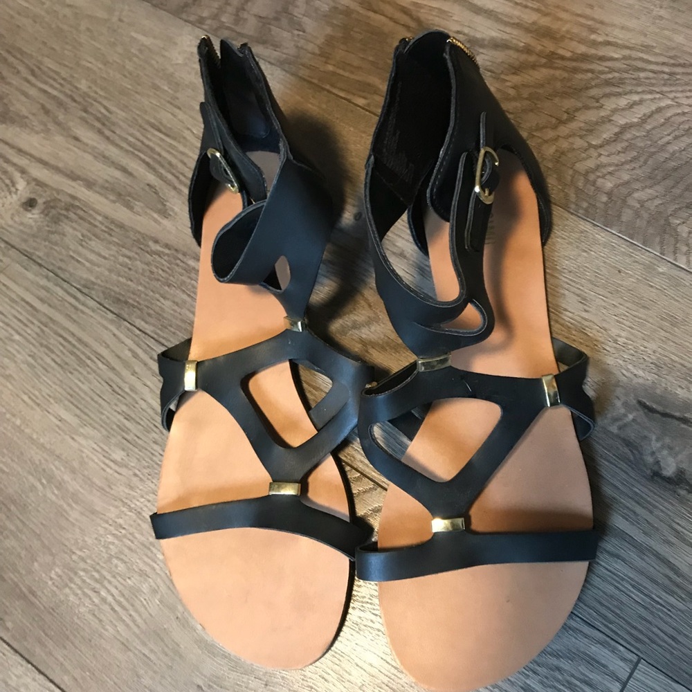 Black sandals.